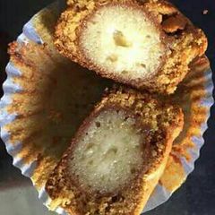A picture of Gulab jamun stuffed cupcakes or muffins.