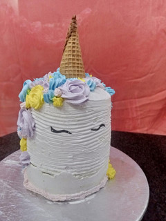 A picture of Unicorn theme Cake.