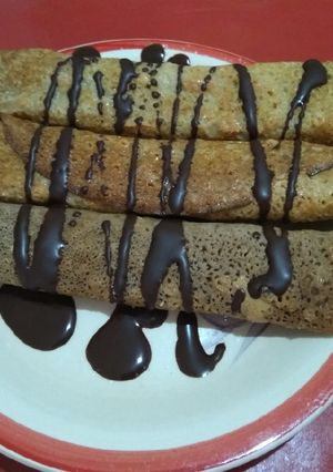 Una foto de Panqueques de cacao amargo y nuez 😋