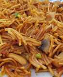 Fideos secos con sepia y verduras