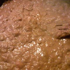 A picture of how to prepare canned refried or whole beans to taste almost as good as home made.