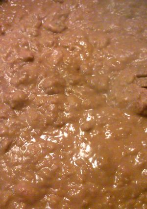 A picture of how to prepare canned refried or whole beans to taste almost as good as home made.
