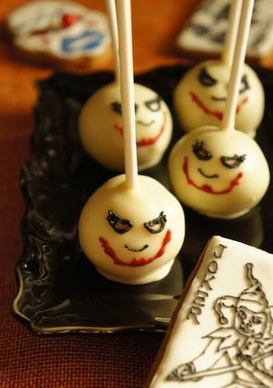A picture of Halloween Themed "The Joker" Cake Pops.