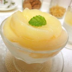 A picture of Peach Compote Served With Yogurt.