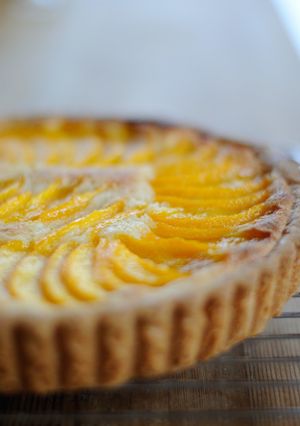 A picture of Yellow Peach Almond Cream Tart.
