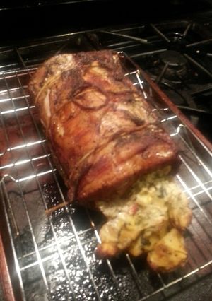 A picture of Creamy Spinach Artichoke Pork Roulade.