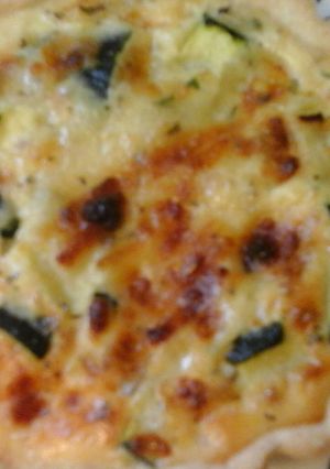 A picture of Low calorie courgette mini quiche with cheese straws.