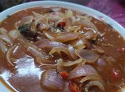A picture of sardines onions