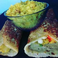 A picture of Potatoes stuff semolina dosa with poha.