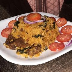 A picture of Rice and beans jollof.