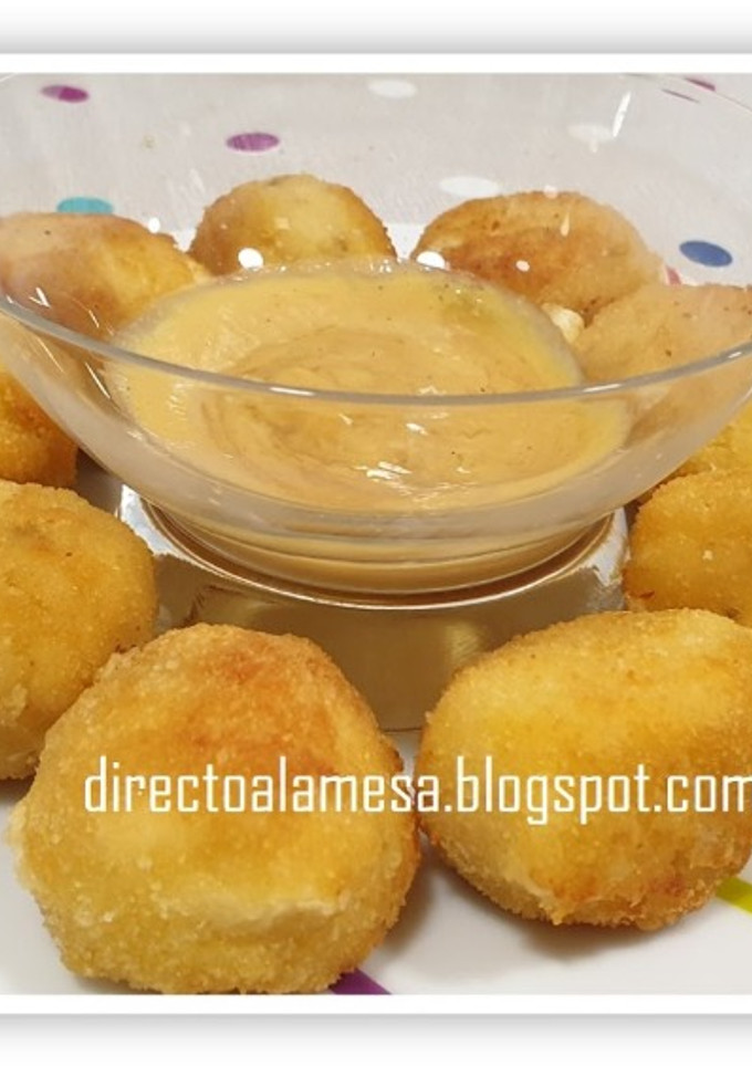 Una foto de Bolitas de arroz y queso