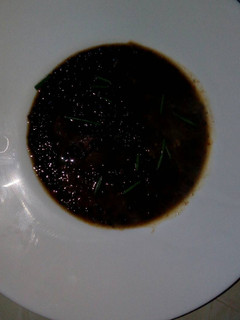 Una foto de Lentejas caviar con calamar al pimiento choricero