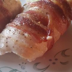 A picture of Bacon Wrapped Cream Cheese Stuffed Chicken Breast.