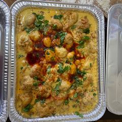 A picture of Pakora KadhiPakora Kadhi is a tangy yogurt base curry which has deep fried pakoda (fritters).
