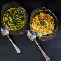 A picture of Hyderabadi style Soya Nuggets ki Biryani and Safed Mirchi ki Salan.