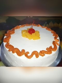 Una foto de Pastel tres leches de durazno