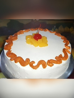 Una foto de Pastel tres leches de durazno