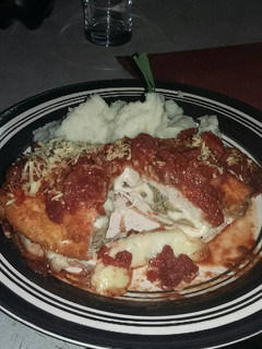 Una foto de Supremas a la parmesana rellenas