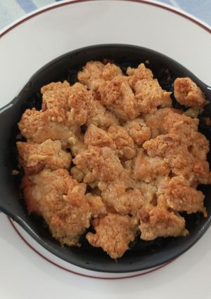 Une photo de Crumble saumon épinards