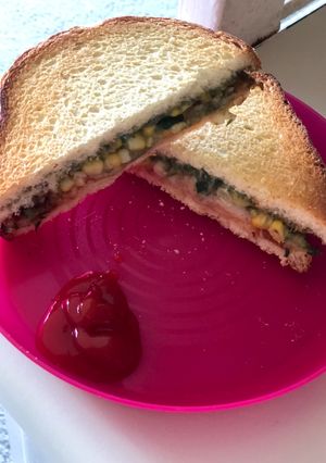 A picture of Cheese corn sandwich.