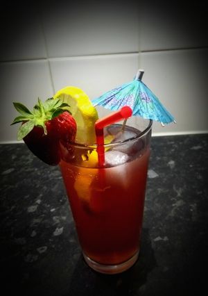 A picture of Blood orange and cranberry cocktail.