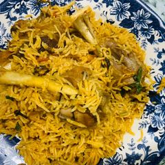 A picture of Mutton leg shanks biriyani.