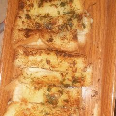 A picture of Cheesy garlic bread sticks.