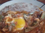 Una foto de nopales y tomate