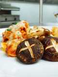 Gratinated milky mushroom with bolognese sauce and assorted mushroom