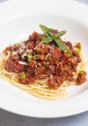 A picture of Spaghetti bolognese with Thai green pesto.