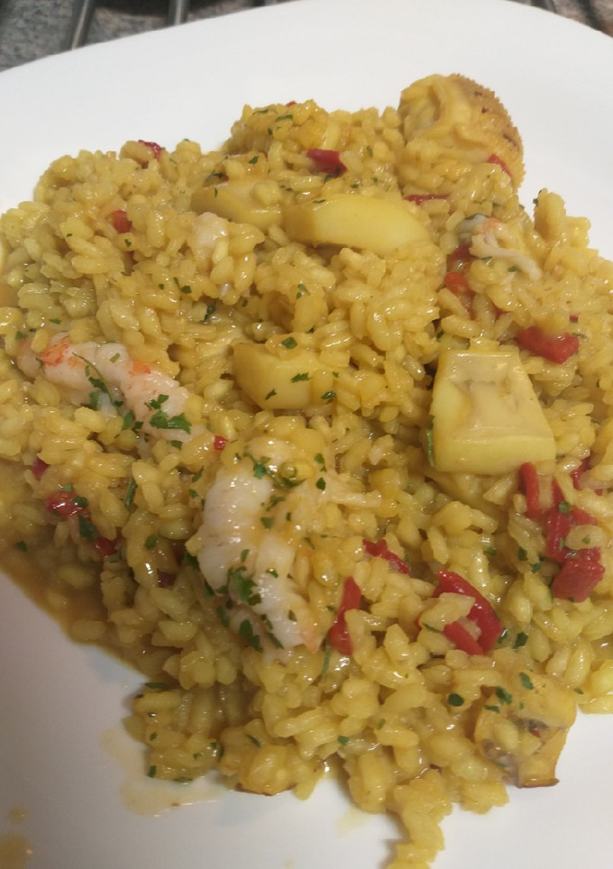 Una foto de Arroz a banda