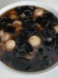 Grass jelly with lychees, tapioca pearls, glutinous rice balls and sago dessert