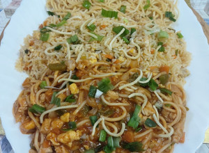 A picture of American chopsuey with fried rice.