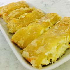 A picture of Four Cheese- Cheesy Roll Ups.