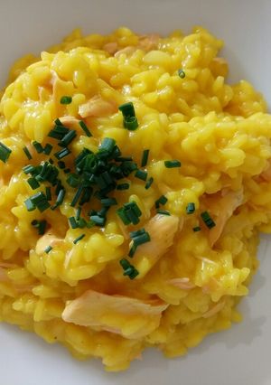 A picture of Risotto with fresh salmon fillet and saffron.