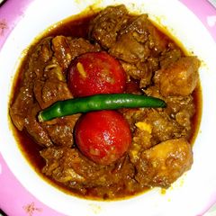 A picture of Chicken plum curry.