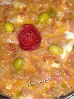 صورة لوصفة شكشوكة بالبصل والطماطم