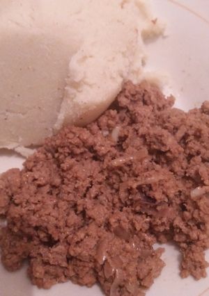 A picture of Fried minced meat with ugali.