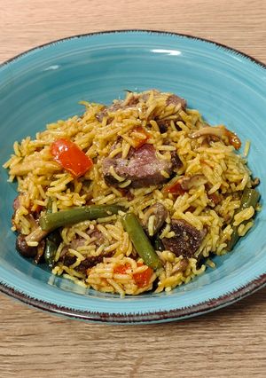 Una foto de Cazuela de arroz con magret de pato