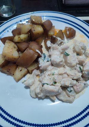 Una foto de Pollo a la Crema con Papas al Horno