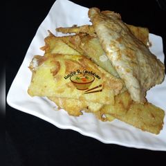 Fried yam nd egg A picture of Fried yam nd egg.