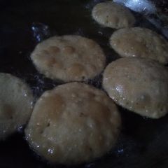 A picture of Bedwa puri with aalu ki sabzi.