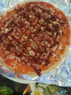 Una foto de Pizza de carne con barbacoa