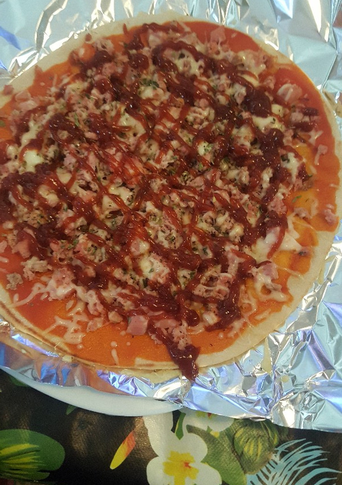 Una foto de Pizza de carne con barbacoa