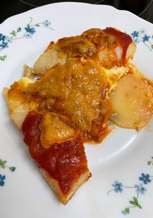 Una foto de Bacalao con crujiente de ajo