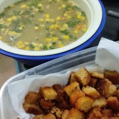 A picture of Healthy Vegetable corn soup with bread crumbs.