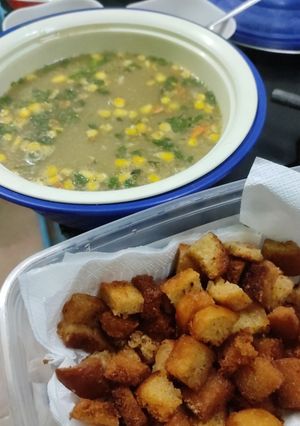 A picture of Healthy Vegetable corn soup with bread crumbs.