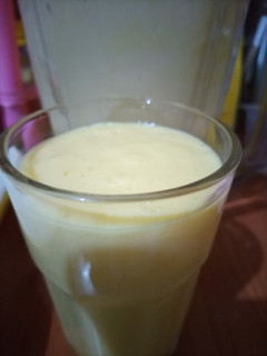 A picture of Pineapple banana mango smoothie.