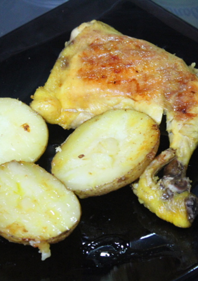 Una foto de Contramuslos de pollo con patatas al grill doble