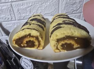 Una foto de Pionono relleno de dulce de leche👩🏻‍🍳